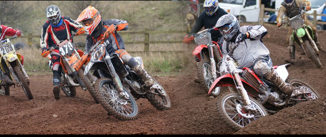 Experienced riders racing into a corner